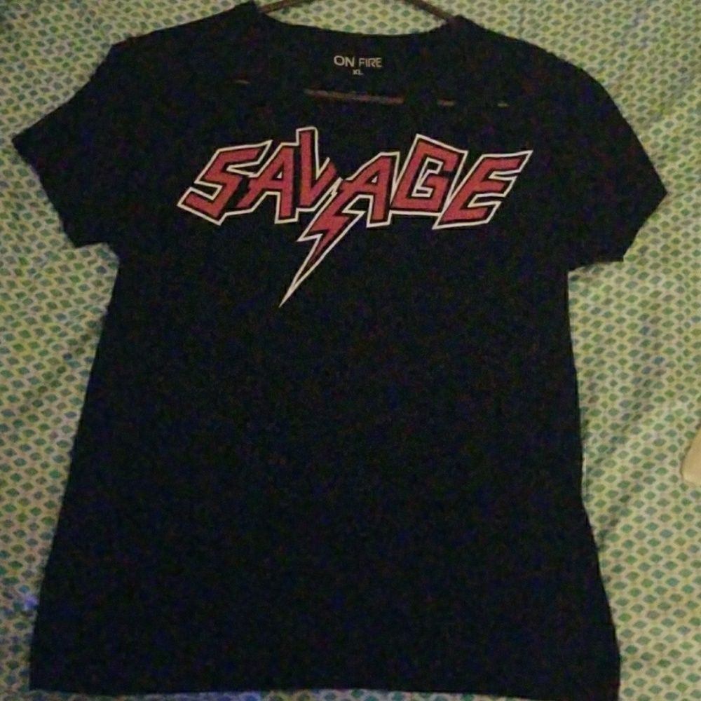 T-shirt that says savage and hole designs.